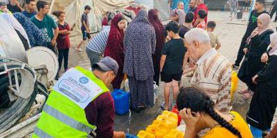 Özgür-Der Gazze'de su ve yemek dağıtımı gerçekleştirdi